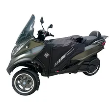 TABLIER COUVRE JAMBE TUCANO POUR PIAGGIO 125 MP3 2006>, 250 MP3 2008>, 300 MP3 2012>2018, 400 MP3 2008>2021, 500 MP3 2010>2021 (R062PRO-X) (TERMOSCUD PRO 4 SEASON) (SYSTEME ANTI-FLOTTEMENT SGAS)